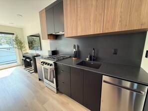 Coffee/tea maker, fridge, microwave, oven