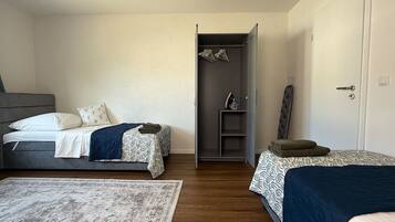 2 bedrooms, desk, iron/ironing board, travel crib