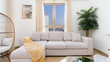 Superior appartement, gedeeltelijk uitzicht op oceaan | Woonruimte