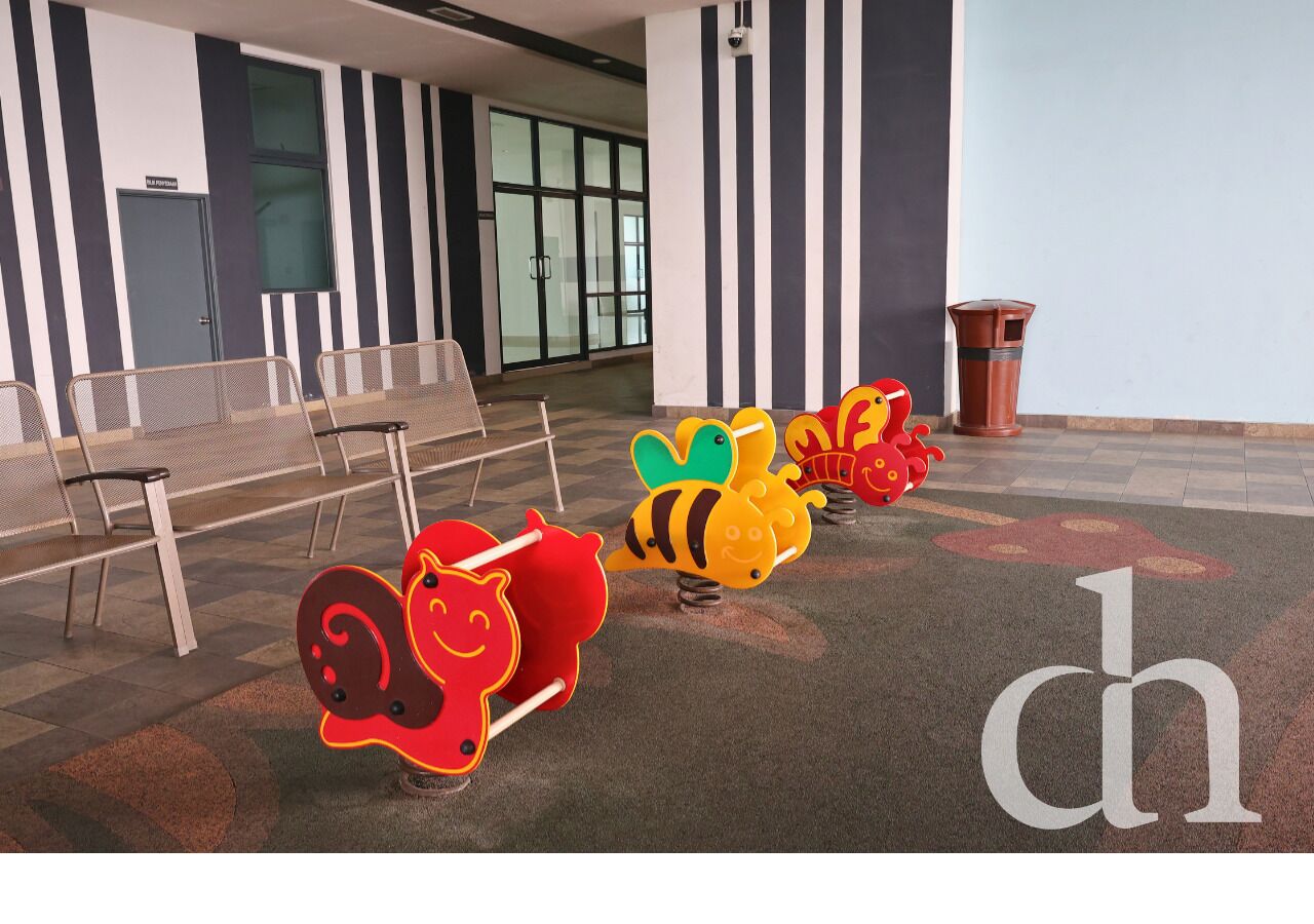 Área de juegos infantiles techada