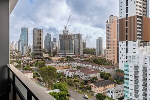 A cityscape with high-rise buildings, some under construction, and a mix of residential and commercial structures. - Modern living, prime location, everything within easy reach - Broadbeach stay. (Broadbeach)