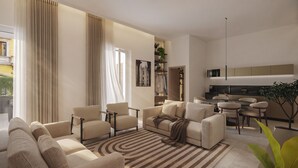 Ein modernes Wohnzimmer mit einer Sofagarnitur, einem Essbereich mit Tisch und Stühlen sowie einer Küche mit einer Mikrowelle.
