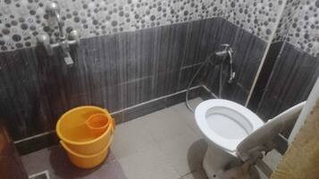 Junior Double Room, City View | Bathroom | Shower, free toiletries, towels, soap