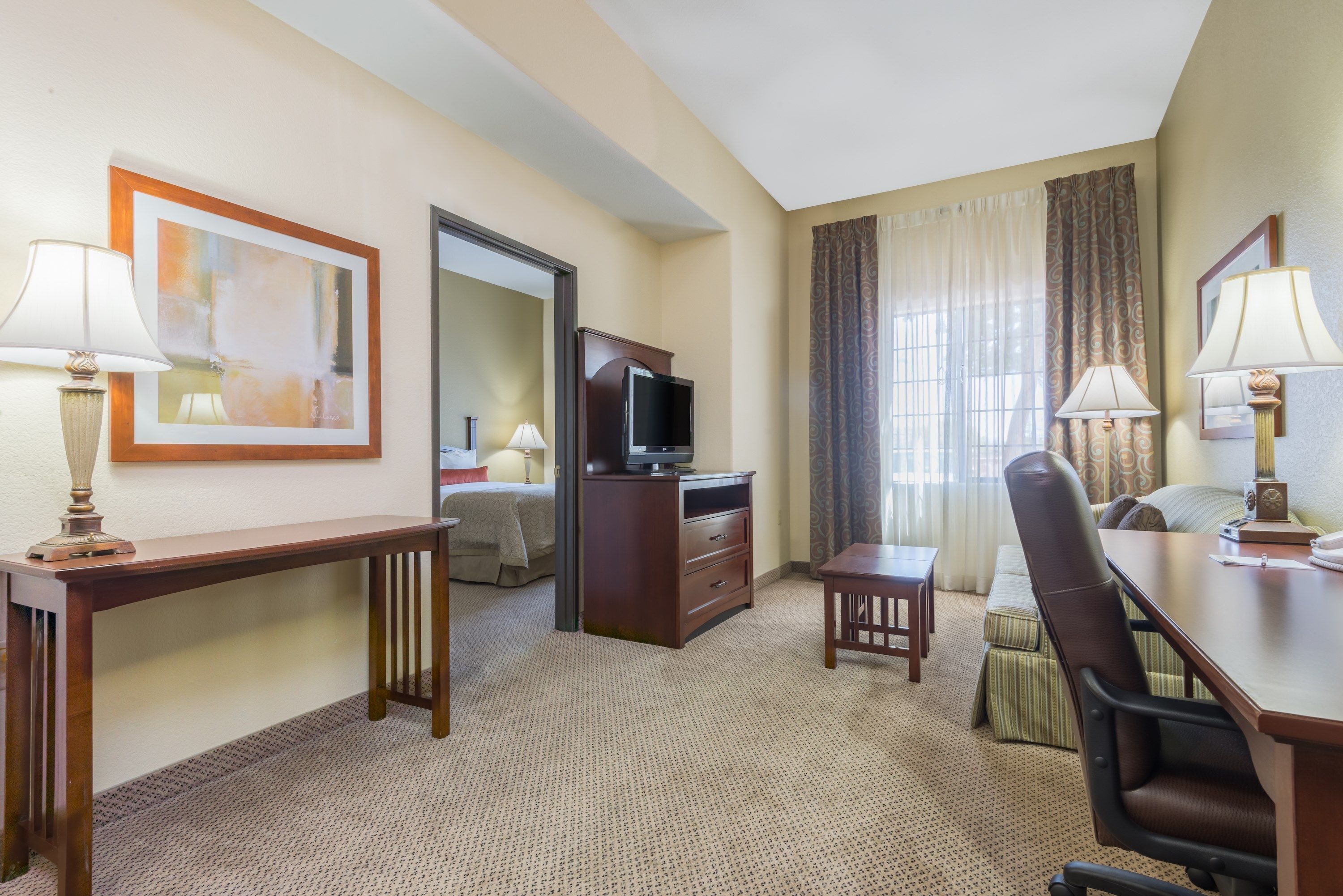 Comfortable living area with soft furnishings and natural light.