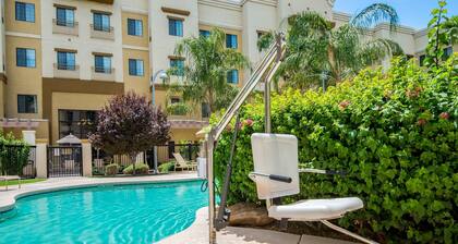 Accessible 2BR Suite w/ Pool + Daily Breakfast