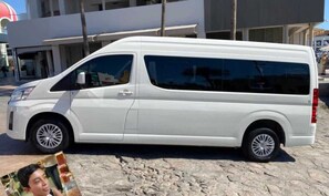 A white van parked on a cobblestone street. - Marbella Lane Premium Ocean View Villa & Pool (Cabo San Lucas)