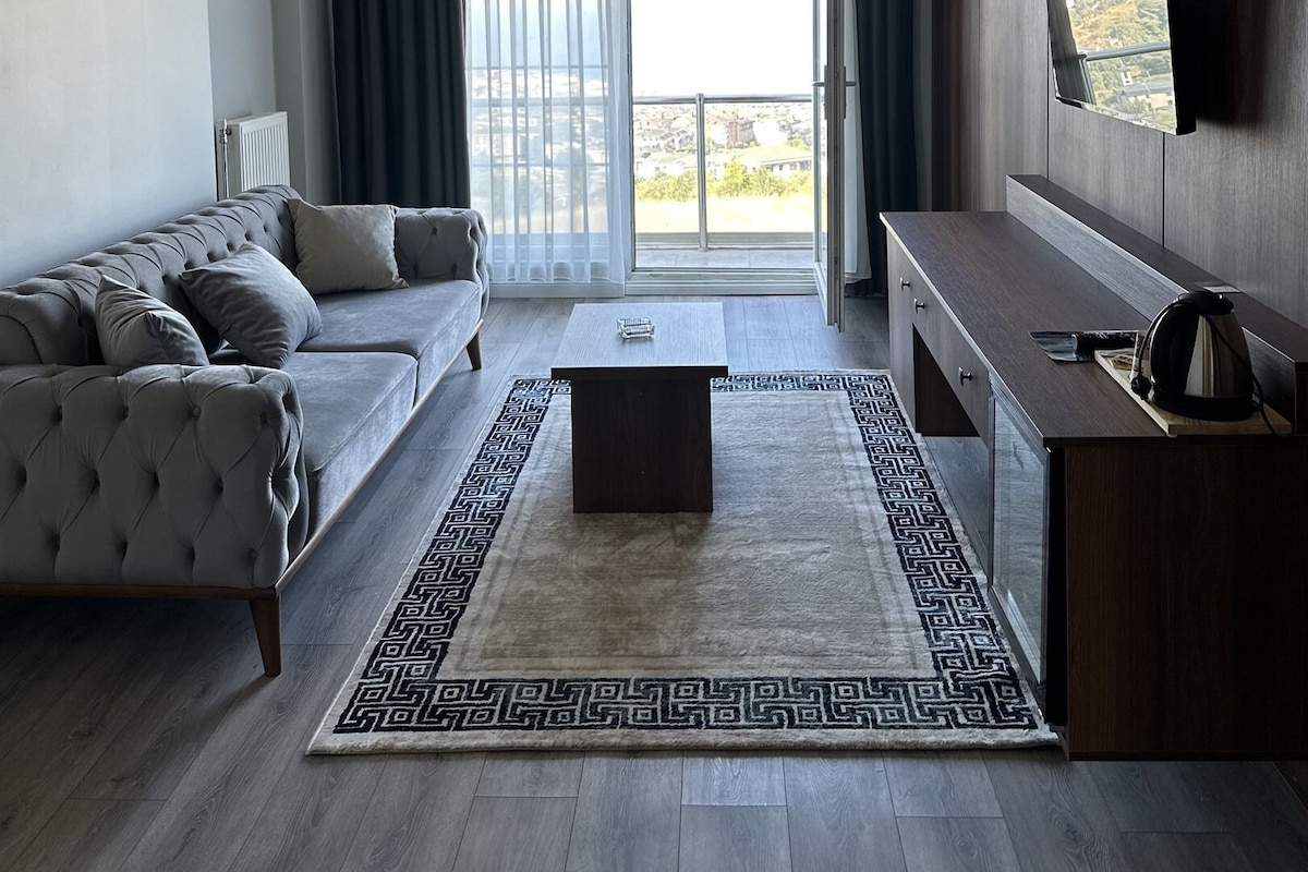 Habitación triple familiar, vista al mar | Wifi gratis y ropa de cama