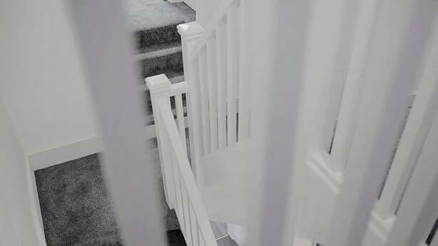 A staircase with a white railing leading to a landing. - Spacious Retreat With Backyard Bliss Sleeps 7 (Bishop Auckland)