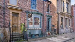 A brick building with a bar named 'No 8' on the ground floor. - Stylish 1BR Home Near Station by Stay With Us (Hartlepool)