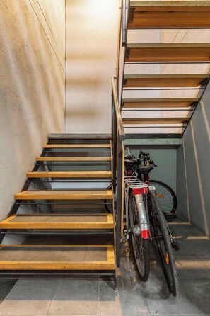 A staircase with a bicycle parked beside it. - Tullo Place Richmond Heritage with Artistic Charm (Richmond)
