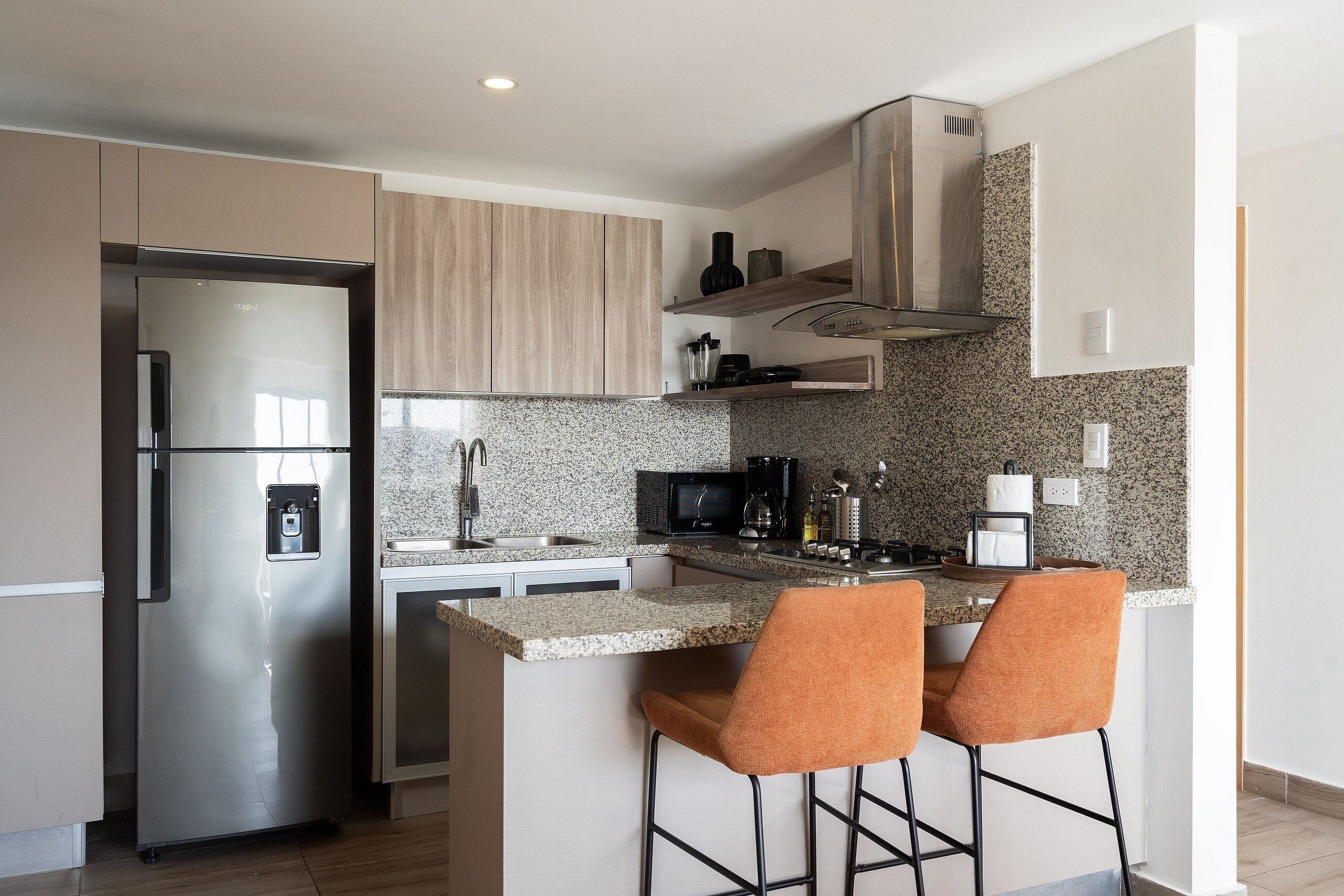 Coffee/tea maker, fridge, microwave, oven