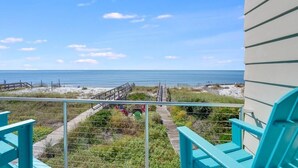 A balcony with a view of the beach and ocean. - Singing Waves (Port St. Joe)