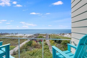 A balcony with a view of the beach and ocean. - Singing Waves (Port St. Joe)