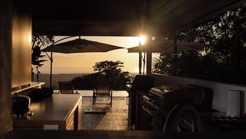 Exclusive Villa, Private Pool, Ocean View | Private kitchen | Dining table