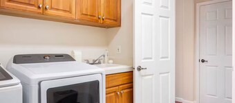 home away from home spacious 3b 2b mobile home covered back porch with hot tub..