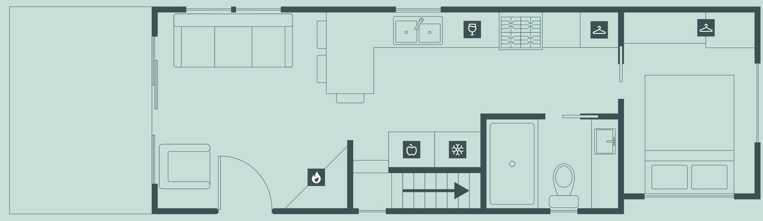 A hotel floor plan with a kitchen, dining area, and a bathroom.