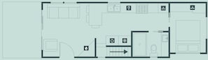 A hotel floor plan with a kitchen, dining area, and a bathroom.