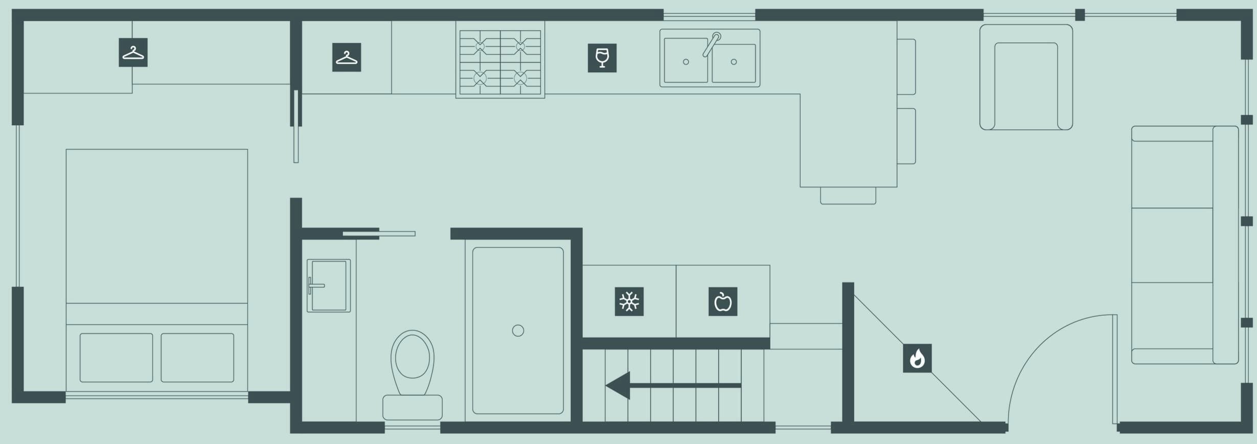 Plano de planta de un hotel que incluye baño, kitchenette y zona de comedor.