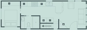 A hotel floor plan with a bathroom, kitchenette, and a dining area.