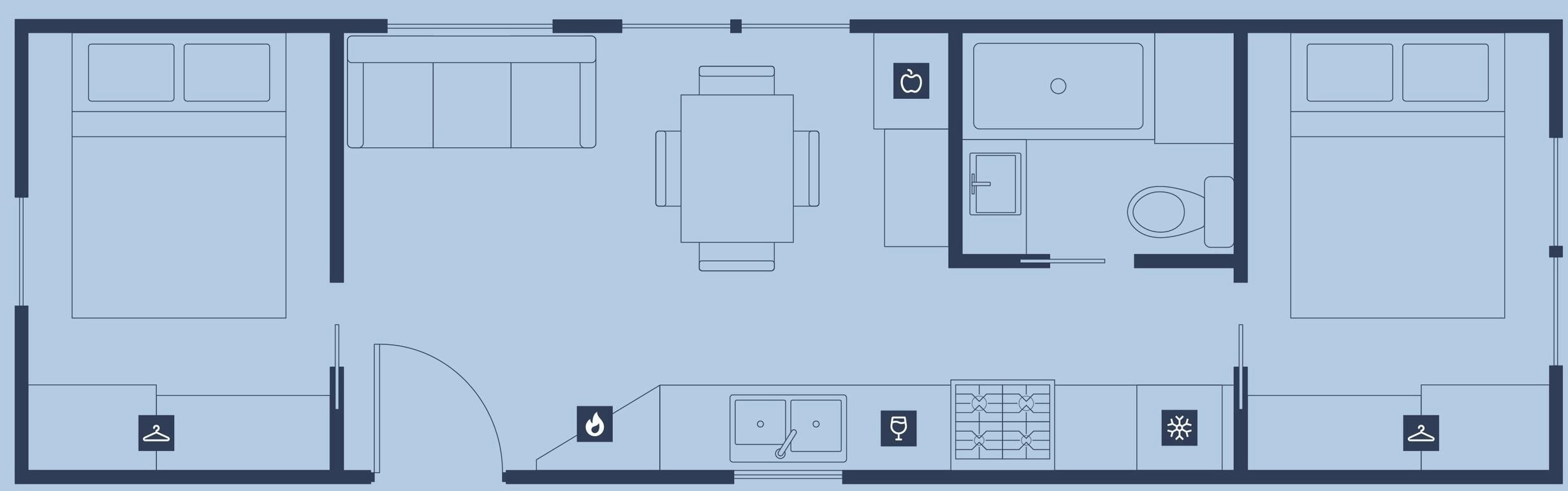 Plano de planta de un hotel que muestra una habitación central amplia, un comedor, una cocina y un baño.