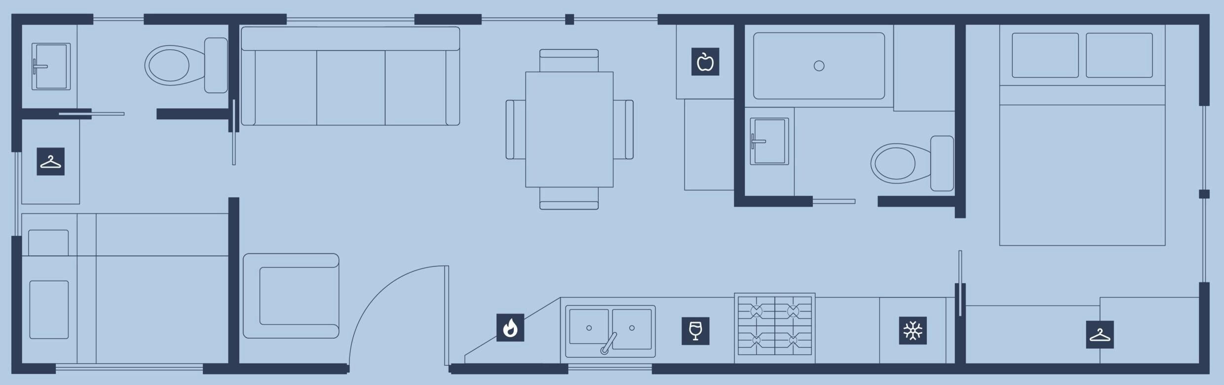 Plano de planta de un hotel con zona de comedor, cocina y una habitación con cama y baño.