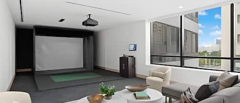 Una sala de estar moderna con una pantalla de proyector, asientos cómodos y un amplio ventanal con vista a la ciudad.