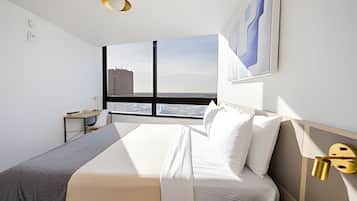 Superior Apartment | Desk, laptop workspace, blackout drapes, soundproofing
