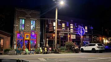 A building with a sign that reads 'L.L. Bean' and a street lamp in front.