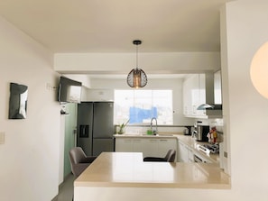 Apartment | Private kitchen - Miraflores duplex with ocean view garage (Lima)