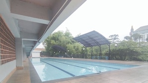 Pool - Calming Wooden Touch Studio Room At Apartment Soekarno Hatta (Suhat) Malang (Malang)
