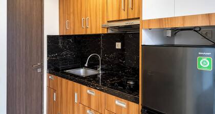 Modern Breezy Studio At Apartment Tamansari Skylounge Balikpapan