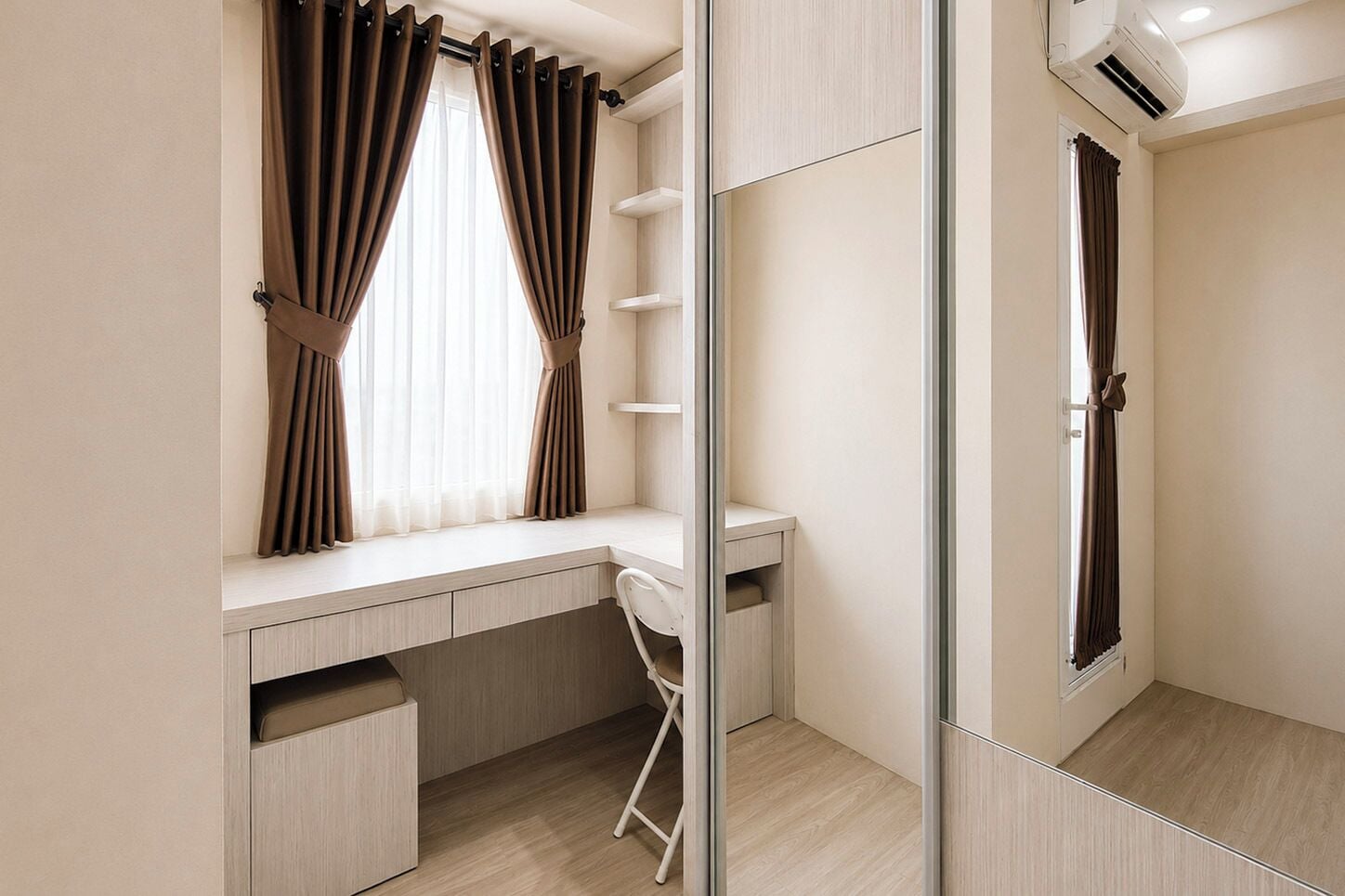 A modern bedroom with a built-in desk, a chair, a wardrobe, and a mirror.