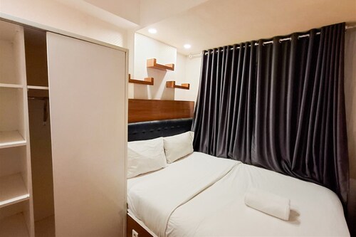 Cozy And Homey 2Br At Apartment Vida View Makassar