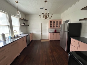 Private kitchen - The Rest House • Curated Cottage in Brenham, Wonderfully Restored 1950's Home (Brenham)