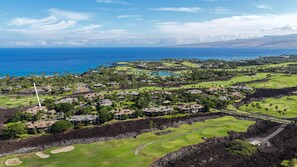 A golf course with a view of the ocean and a residential area with houses. - 🌴 Hale Kolepa | AC | Located By Mauna Lani Golf Course 🌴 (Waimea)