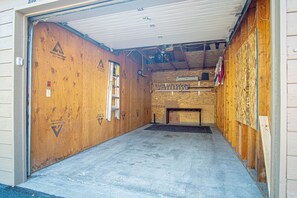 A room under construction with exposed wooden walls, a concrete floor, and construction materials. - Bonne Vie 2209 Modern 3BD/3BA Sun Valley Condo with Garage, Steps from Elkhorn Resort (Sun Valley)