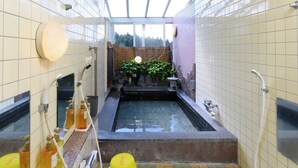Ensemble baignoire-douche, baignoire à l’eau de source