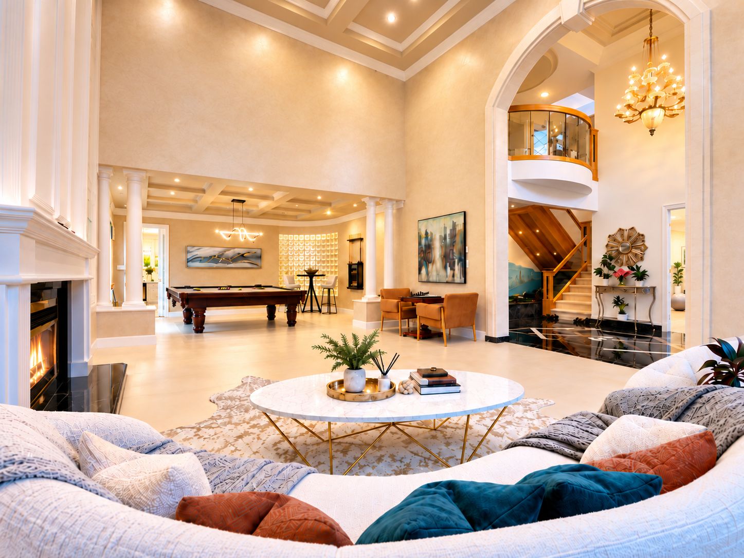 A spacious living room with a pool table, a fireplace, and a seating area with multiple couches.