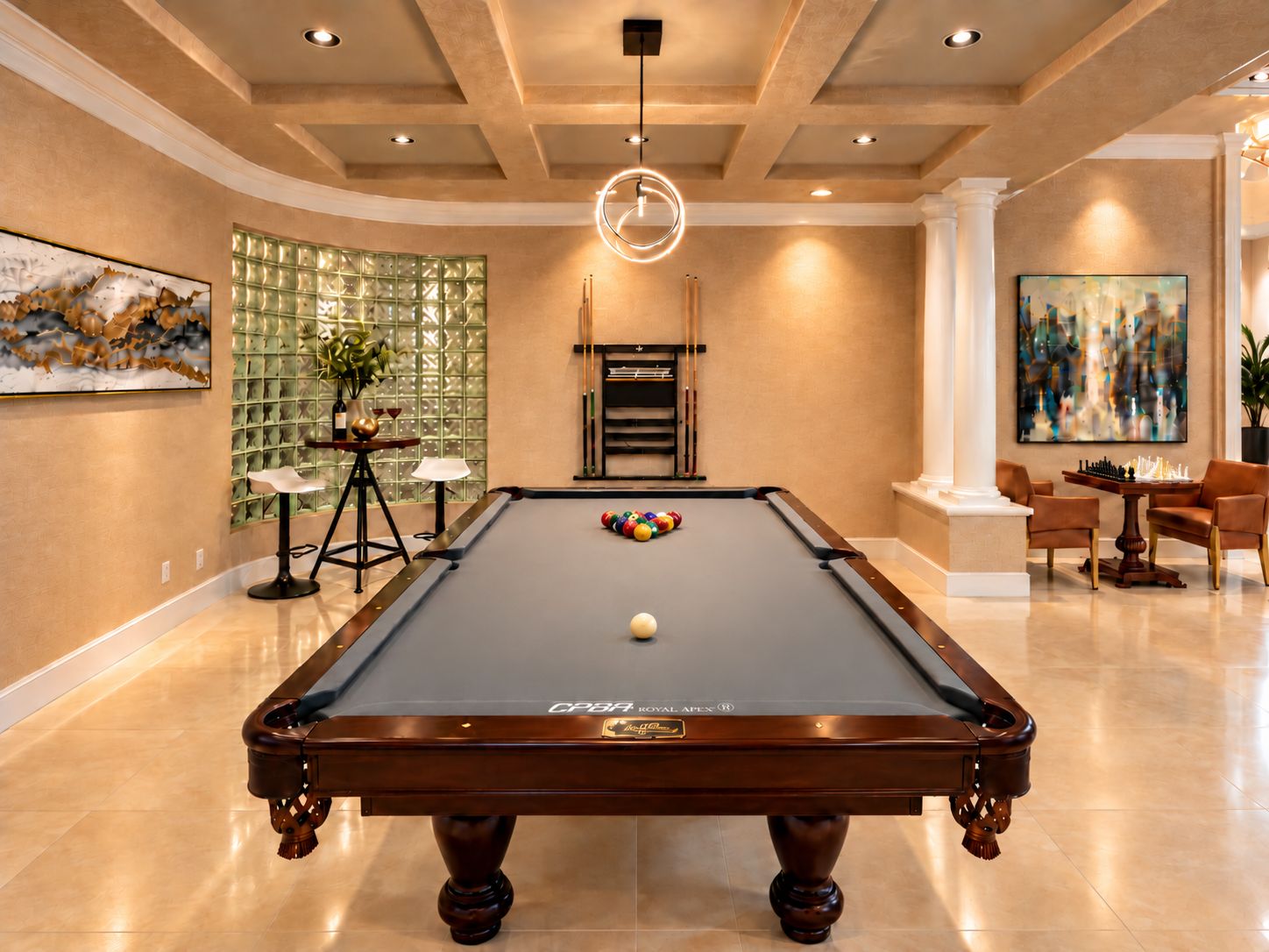 A pool table with a 'CPB Royal Apex' label, surrounded by a modern interior with a chandelier, artwork, and a fireplace.