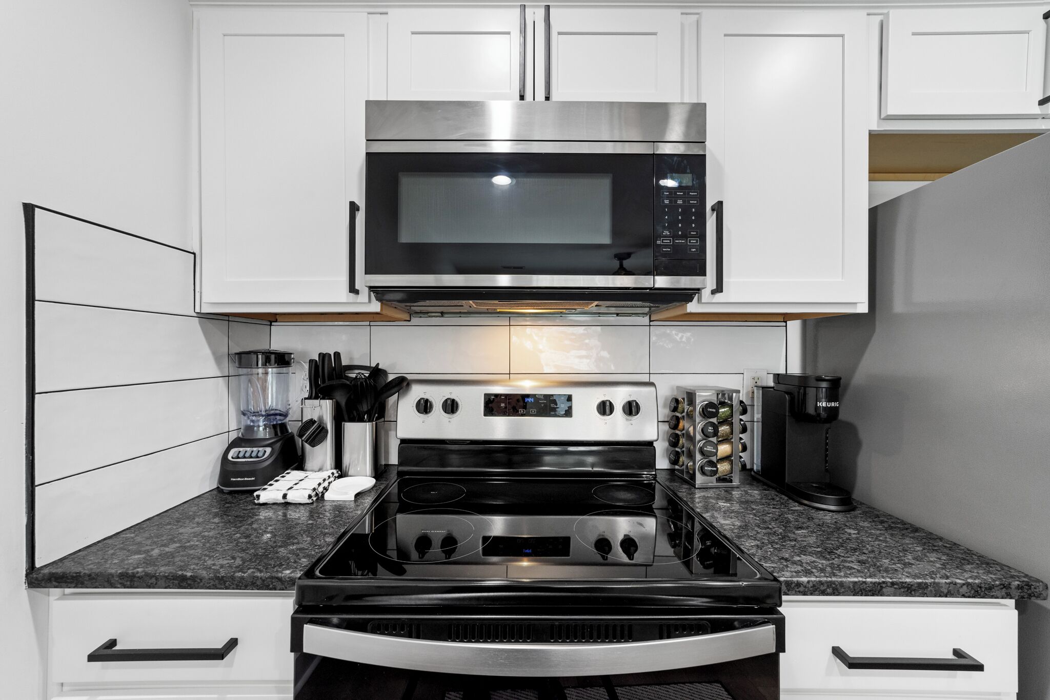 Coffee/tea maker, fridge, microwave, oven