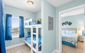 A nearby window brings in natural light, making the space feel bright and welcoming. - Direct Garage Access, Lake View & 5 Pools | Laketown Wharf 226 (Panama City Beach)