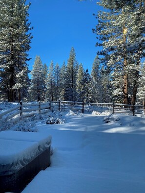A snow-covered landscape with a fenced area and trees. - Beautiful 4-bedroom house Truckee. SKI LEASE  4-5 months. from DEC. 1, 2026 . (Truckee)