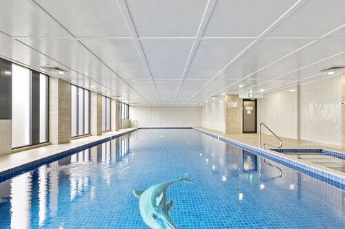 Walk to Accor Stadium | Pool + Parking | Luxe 2BR