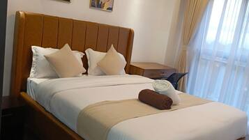Blackout drapes, iron/ironing board (on request), WiFi (free)