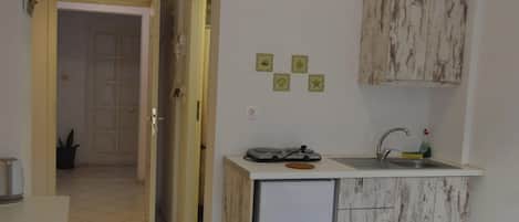 Estudio, 1 habitación, patio | Cocina privada