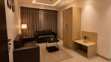 Studio Suite, Balcony | Living area