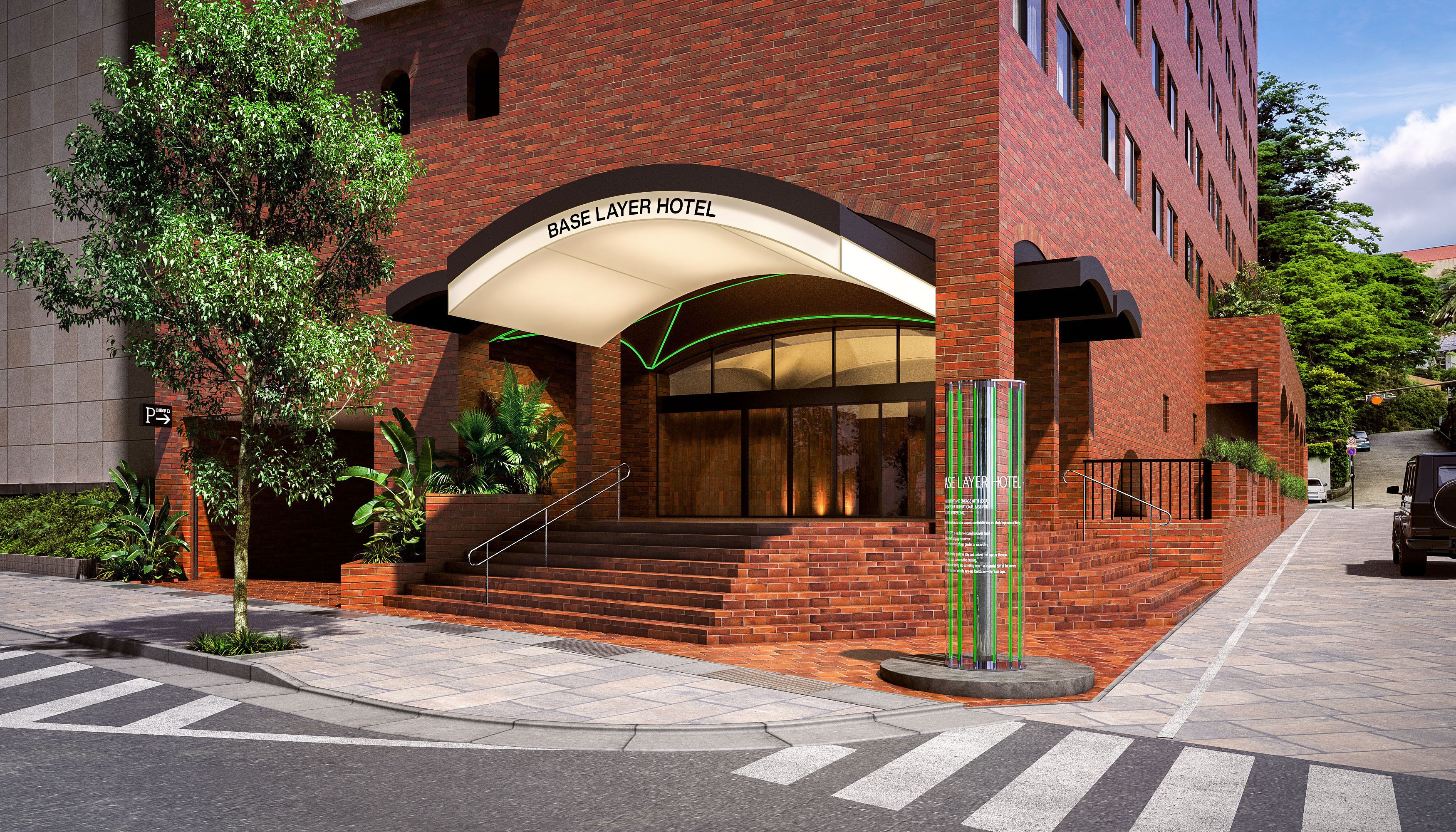 A hotel entrance with a brick facade, a canopy over the entrance, and a sign indicating the hotel name.
