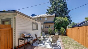 A wooden deck with outdoor furniture, a grill, and a small shed. - Walk to Dtwn Corvallis: Home Near OSU & Riverwalk (Corvallis)