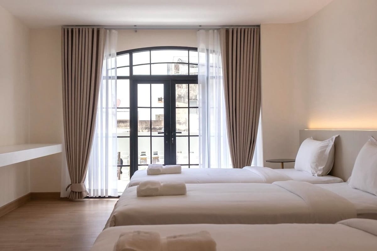Deluxe-Dreibettzimmer | Blick auf die Stadt