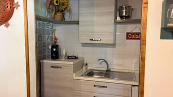 Deluxe Studio Suite, Pool View | Bahagian dalam
